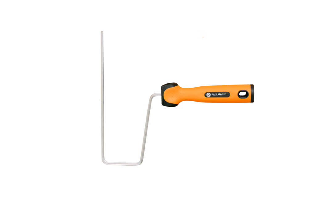 A paint roller frame with an ergonomic bright orange plastic handle and a bent silver metal wire frame, shown on a white background. The handle features a black end cap, a hanging hole and a 'PALLMANN' logo; the metal rod is shaped to hold a cylindrical roller cover. The tool appears clean and ready for painting walls or ceilings, combining a comfortable grip with sturdy construction.